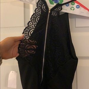 Black peplum dress with lace back detail